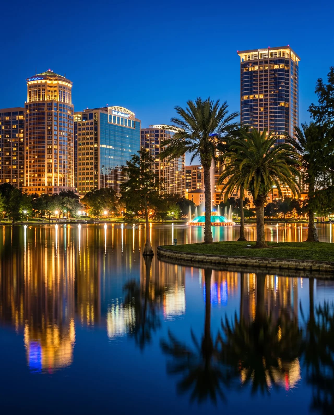 The downtown Orlando skyline reflected in Lake Eola at dusk